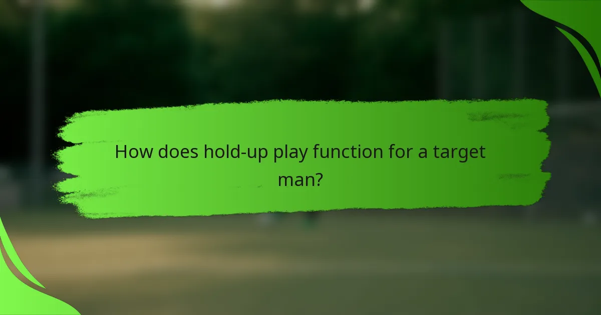 How does hold-up play function for a target man?